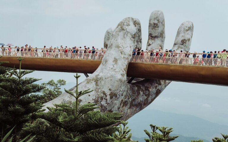 people walking on bridge during daytime